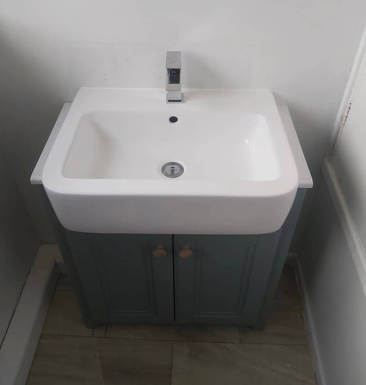 New basin and grey vanity unit with chrome mono tap